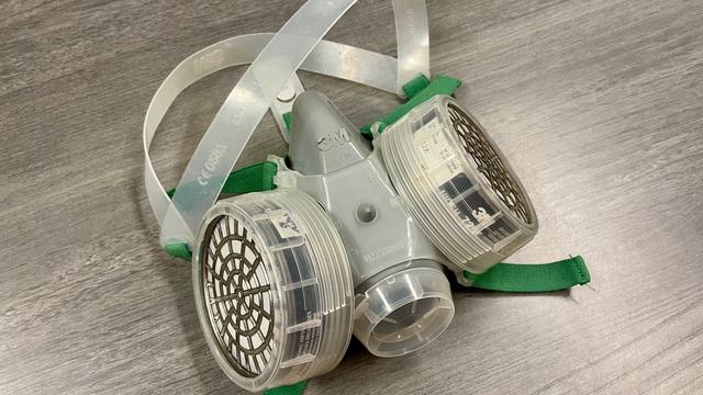 Image of a half-face respirator mask with cartridge filters