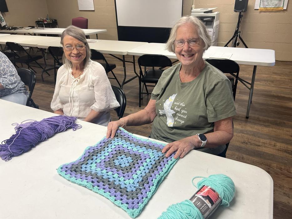 Fran taught a crochet skill and the student has mastered the granny square project!