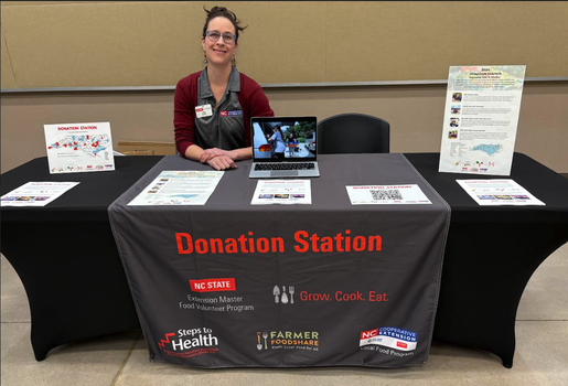 Dr. Bloom promoting the Donation Station at a tabling event at FCS Institutes