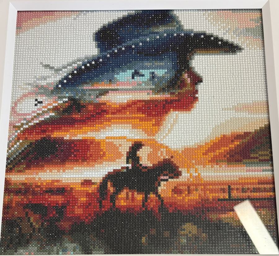 Senior Craft Champion- Madison Bishop. Art made with beads, with a cowgirl silhouette and running horse in the background.