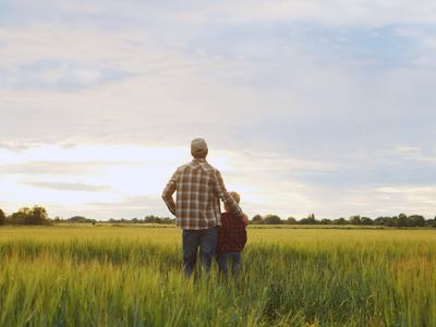 father and son in field