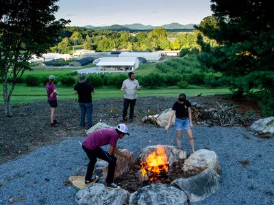 View of Mountain Horticultural Crops Research Station with firepit in foreground