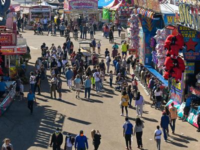 Image of State Fair, people walking, attractions