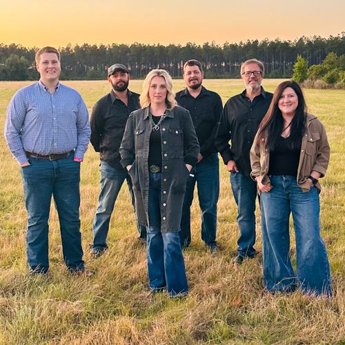 Amanda cook band standing in a field