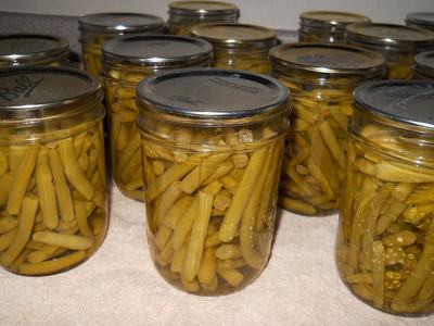 Glass jars of canned green beans