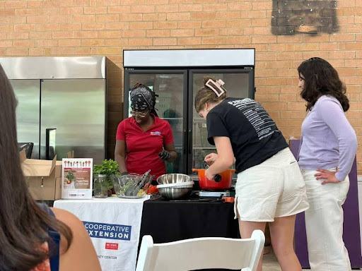 Demetria conducting a cooking demmo