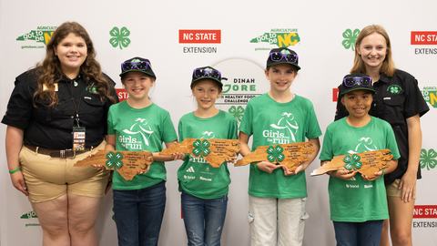 Members of the Orange County Cooking Bobcats pose with their silver award during the 2026 Dinah Gore 4-H Healthy Food Challenge.