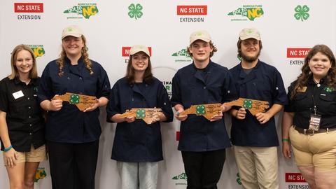Members of the Currituck County Spicers pose with their bronze award during the 2026 Dinah Gore 4-H Healthy Food Challenge.