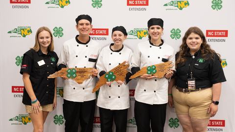 Members of the Lee County 4-H Flavor Fighters pose with their gold award during the 2026 Dinah Gore 4-H Healthy Food Challenge.