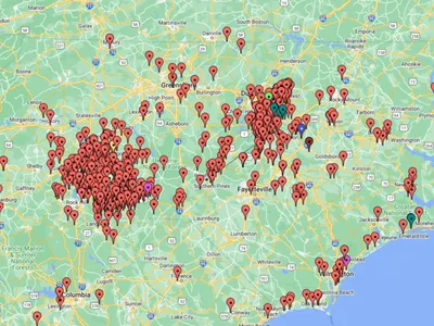 Image of a map of North Carolina with red pins.