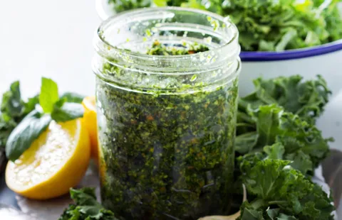 Recipe card for kale, garlic scape, and walnut pesto
