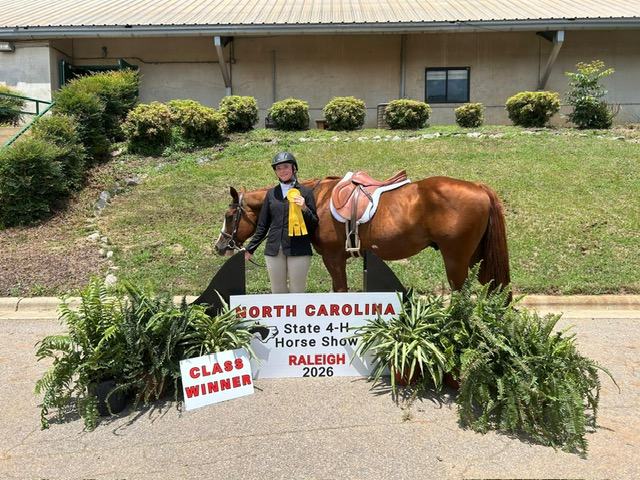 Durham participant poses with their Horse