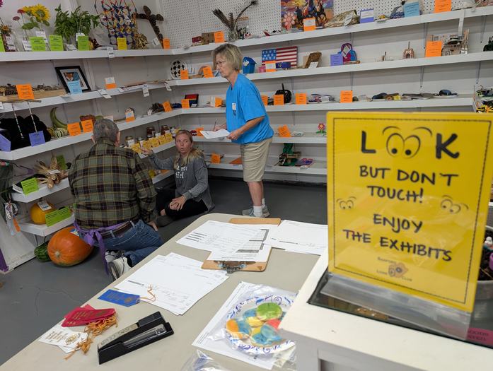 people looking at objects