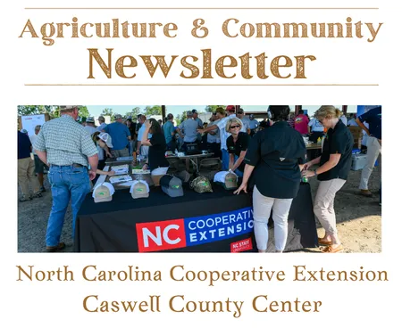 ag& community newsletter: People gathered around looking at a booth of info from NC Cooperative Extension