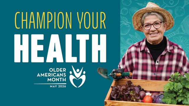Older female holding a basket of vegetables from the garden