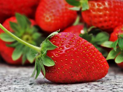 Ripe red strawberries to be used for a fruit salsa recipe
