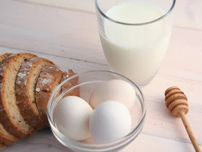 picture of eggs glass of milk and bread