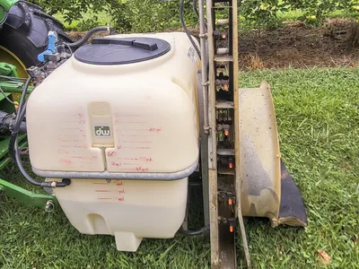 sprayer hooked to a tractor