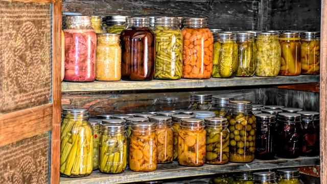 Canned vegetables in a home pantry