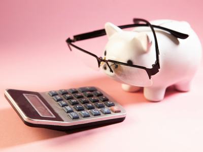 Calculator and piggy bank