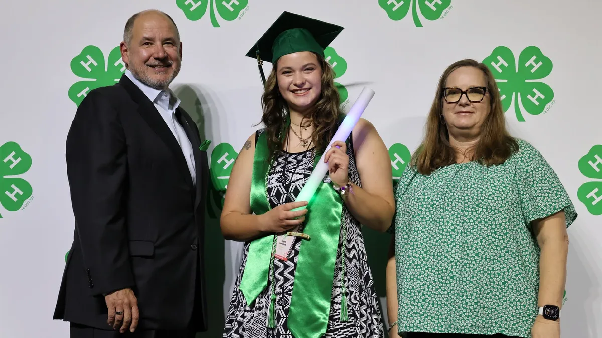 A graduating 4-H member poses after being recognized during the inaugural 4-H Signing Season ceremony at the 2026 North Carolina 4-H Congress.