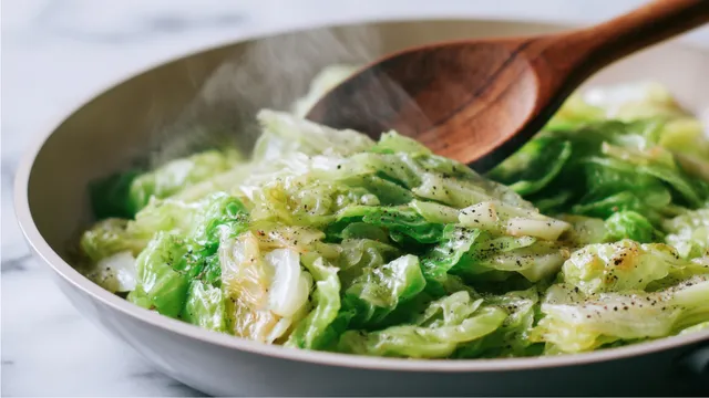 cooking cabbage in a skillet
