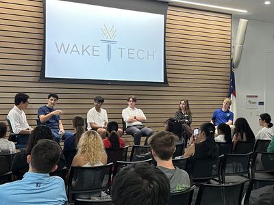 Student panel presenting to a student audience at Wake Tech. Spark Expo 2024.