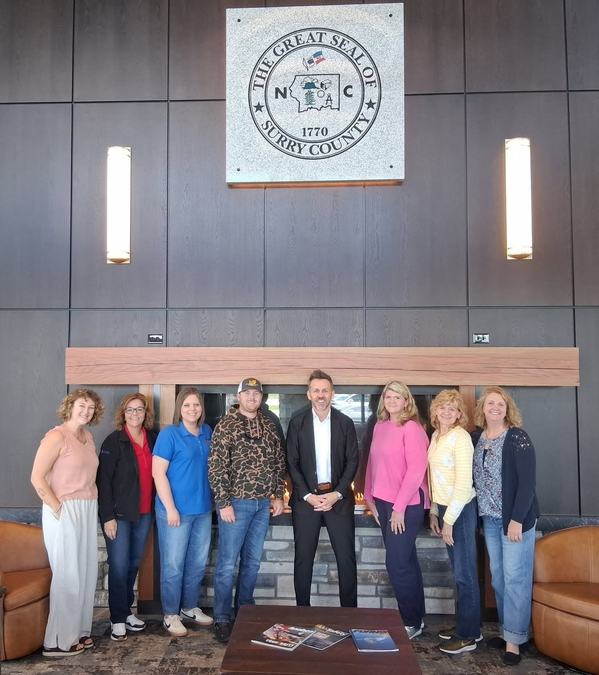 Joanna Radford with Surry County CES Staff and speaker Ronnie Doss during Team Development