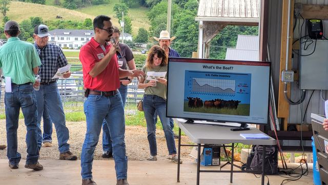 This is a photograph of a NC State Extension Specialist Providing Research Based information about beef cattle production at a field day.